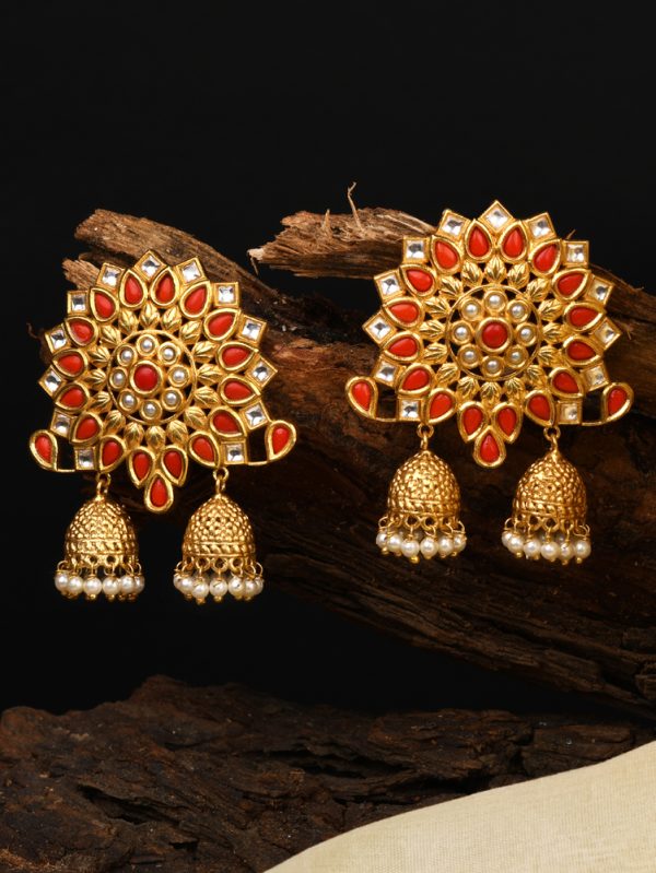 Attachment of double jhumka & green colour stones with pearl styling & dressing of polki creating statement Jhumki Earring.