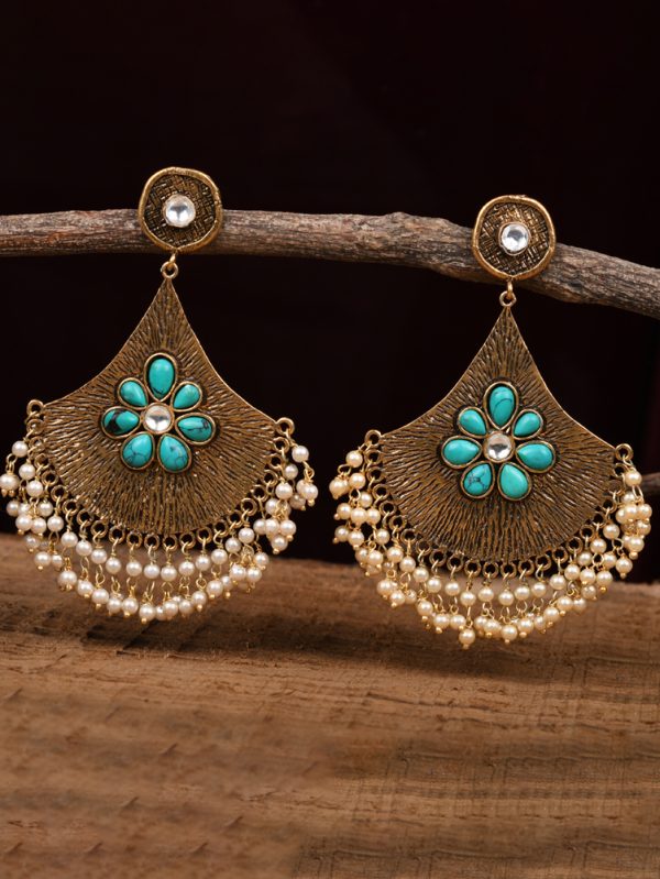 Oxidized & textured work styled with single polki, turquoise with pearls Drops & Danglers.