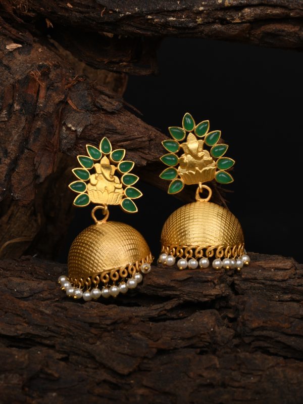 Themed jhumka earring which is styled with green stone & Ganesha.