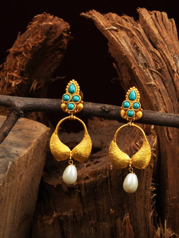 Magnificent creation handcrafted with turquoise & pearl drop.