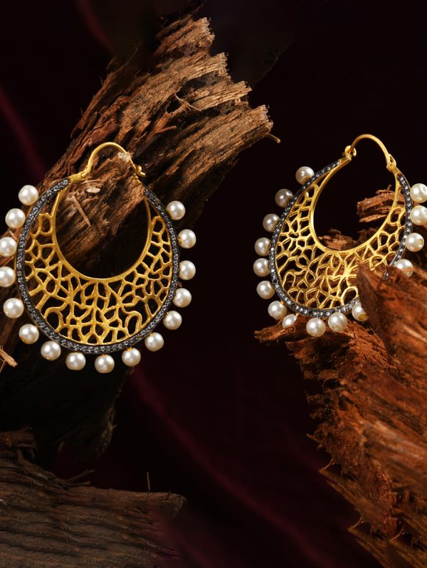 A Unique contemporary textured earring set handcrafted in gold plated with white CZ and pearls.