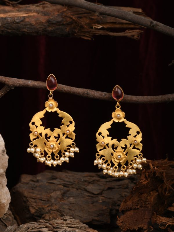 Premium Earrings with Gold Plated Floral teamed up with Matte Finish & Fresh Water Pearls.