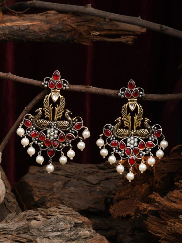Gorgeous Peacock with Red Synthetic Moonga and Polki making Earrings attractive.