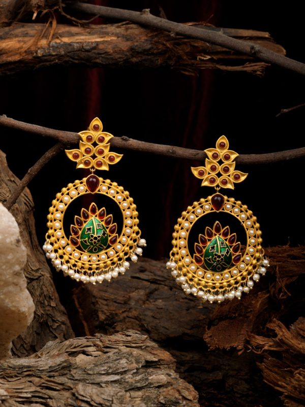 Gold Plated Bali Earrings with Enamel and Red Colour Stone make it look charming.